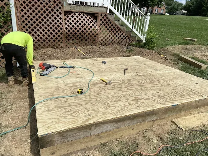 Samuel Construction Group crew building a backyard deck platform in Frederick County, MD